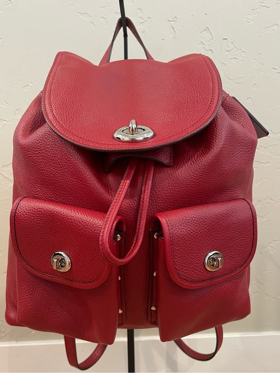 Coach Handbags - Coach EUC Red Pebble Leather Turnlock Backpack with stud pocket detail. ♥️